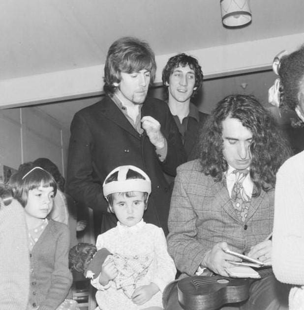 Photo of Pete Townshend, Graham Nash and Tiny Tim