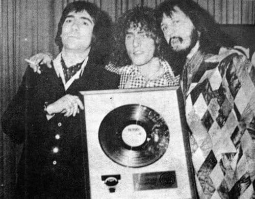 Keith Moon, Roger Daltrey and John Entwistle with Gold Record for the Orchestral version of Tommy on February 28, 1973
