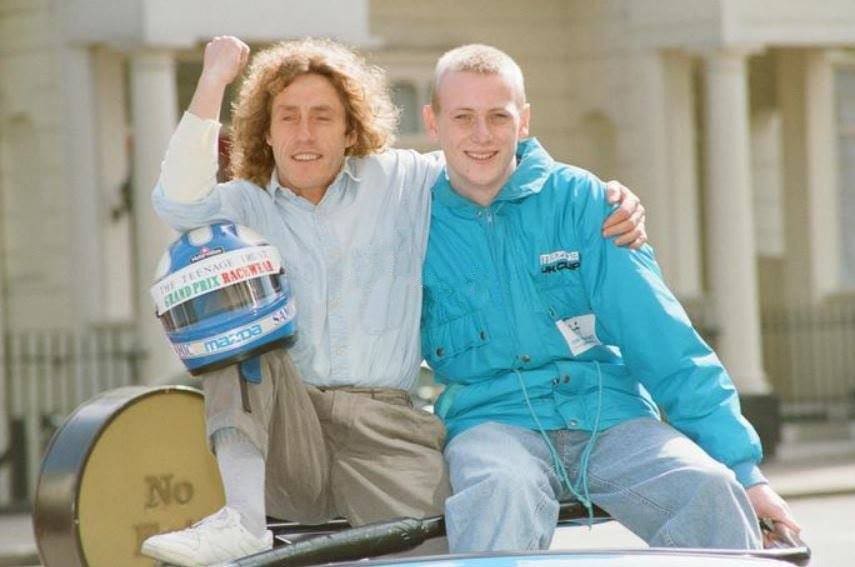 Roger Daltrey poses at a Grand Prix event on May 9, 1991